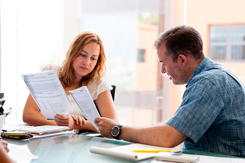 Two students doing exercises in english class at EC Malta