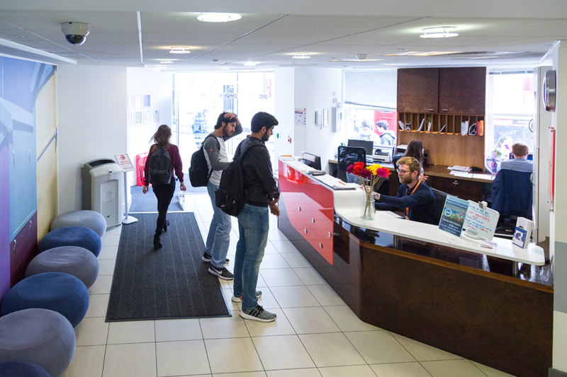 EC Brighton School reception area where lovely staff is happy to support our students with their requests and needs
