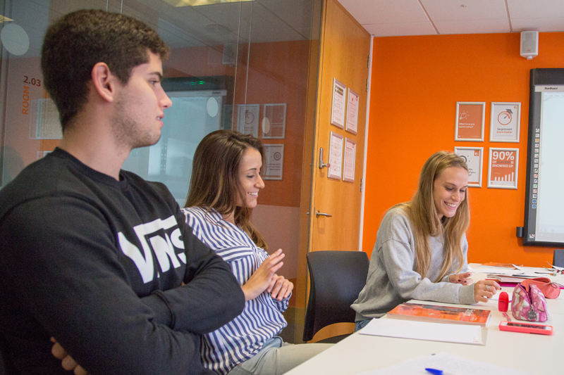 Students in class learning English at EC Brighton Language School UK