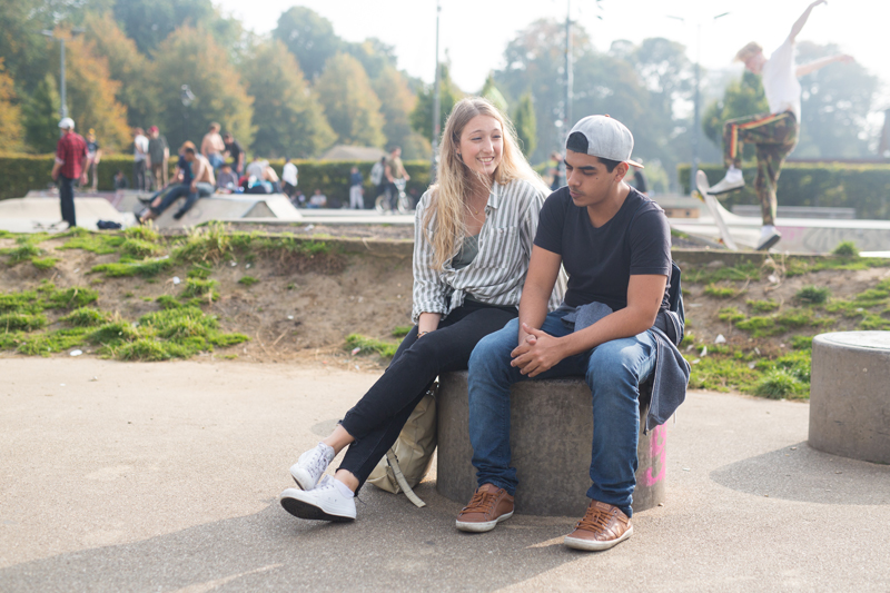 Friends studying English at EC Brighton chilling outside