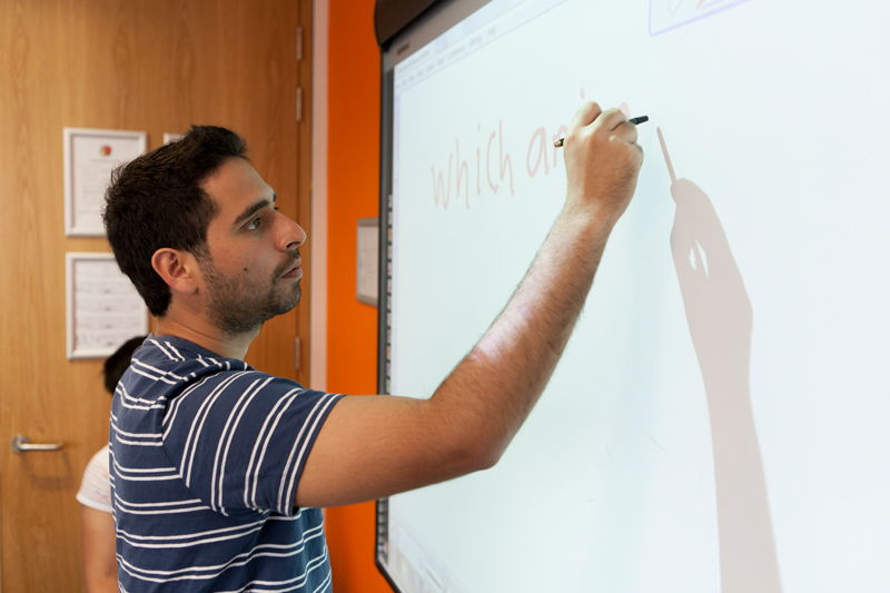 English teacher delivering an English Language lesson in Brighton at the EC School.
