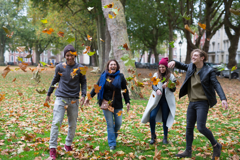 Bristol English School students studying at EC walking in the park