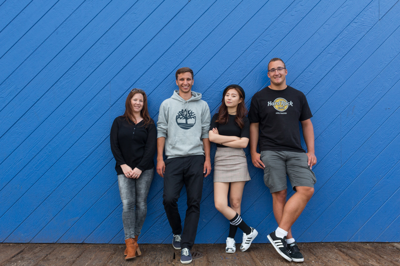 English Students in Los Angeles photo against a beautiful blue wooden wall