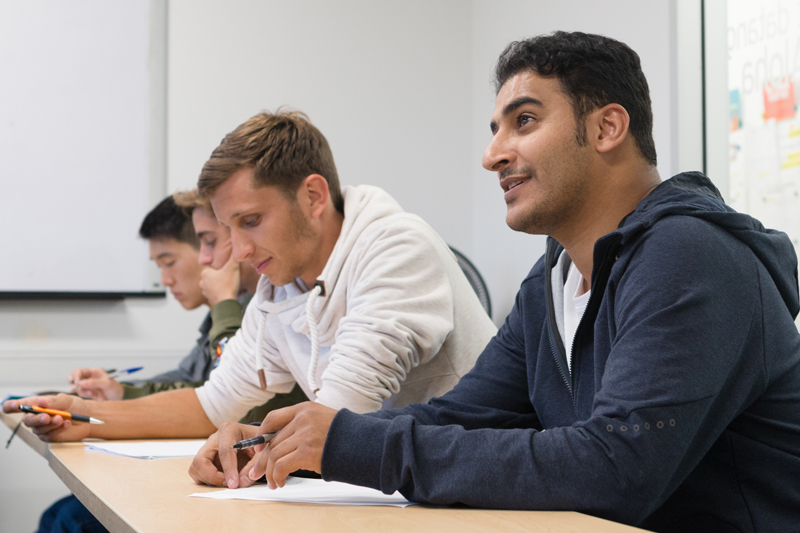 Students talking to their teacher during an English course in Los Angeles with EC