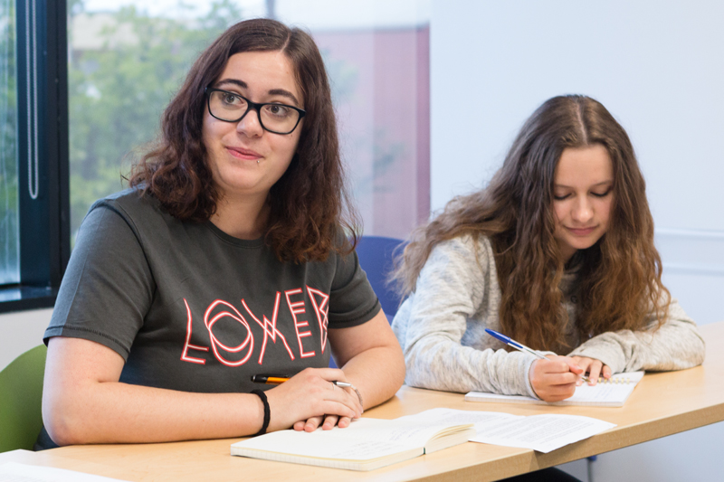 Girls learning English and discussing interesting topics in LA at EC language school